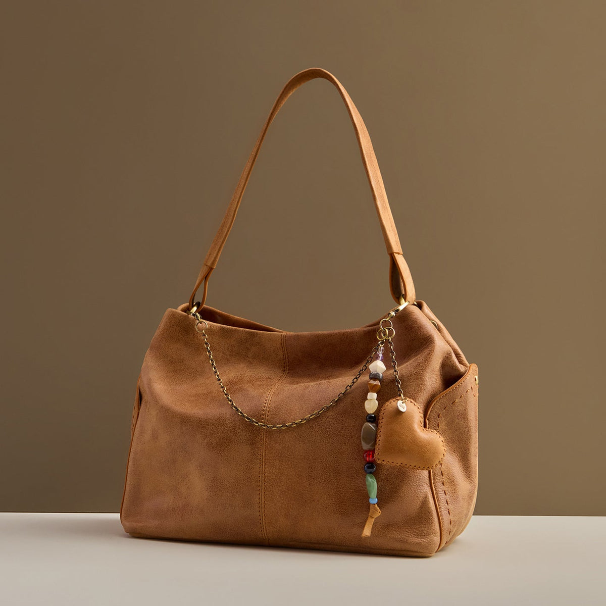 Heart Swells Charm In Buffed Leather - Whiskey