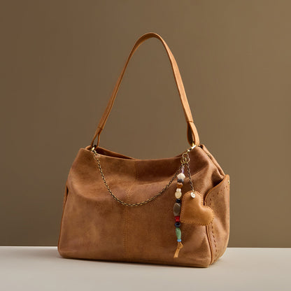 Heart Swells Charm In Buffed Leather - Whiskey